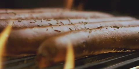 Ingredients falling on sausages 스톡 동영상 247386724