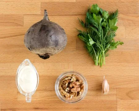Ingredients for making beetroot and nut salad. View from above Stock Photos