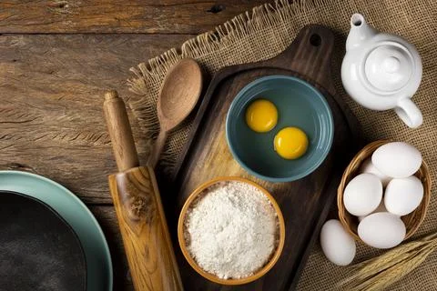 Ingredients for making a cake on the table. Stock Photos