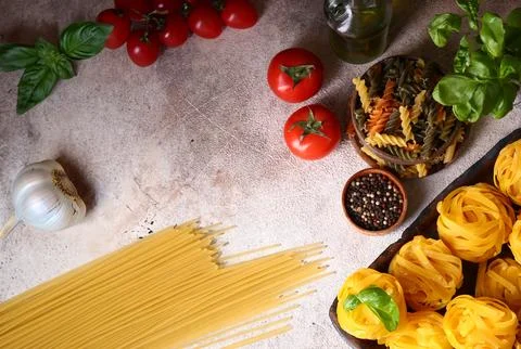Ingredients for making pasta - tomatoes, basil, garlic Stock Photos