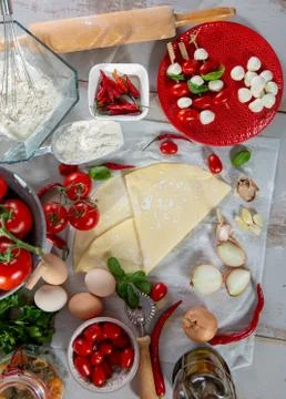 Ingredients for the preparation of the pizza Stock Photos