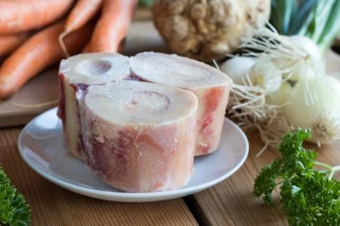 Ingredients for preparing a beef bone broth Stock Photos