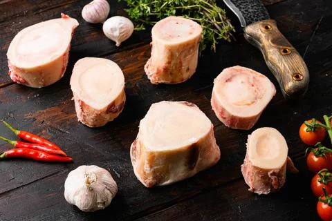 Ingredients for preparing beef broth, on old dark wooden table background Stock Photos