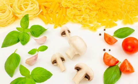 Ingredients for preparing different types of pasta. Italian cuisine. Stock Photos