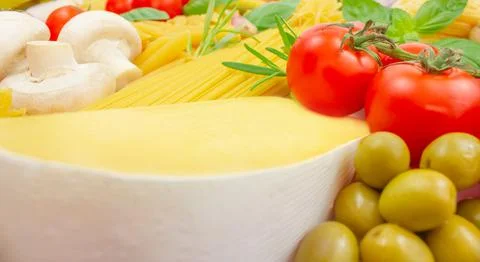 Ingredients for preparing different types of pasta. Italian cuisine. Stock Photos