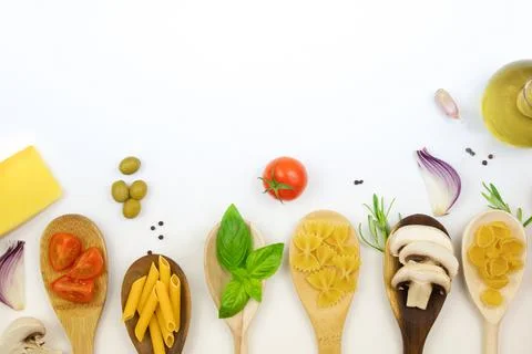 Ingredients for preparing pasta. Layout for the menu. Flat lay. The concept of Stock Photos