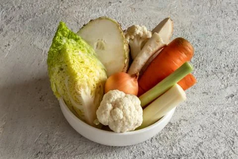 Ingredients for preparing a vegetable broth or soup - carrots, Savoy cabbage, Stock Photos