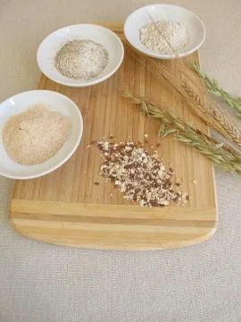 Ingredients for rye bread with rye flour, rye groats, rye sourdough and seed mix Stock Photos