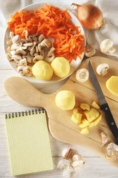 Ingredients for soup and notepad Stock Photos