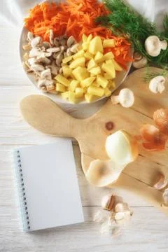 Ingredients for soup and notepad Stock Photos