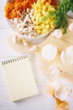 Ingredients for soup and notepad Stock Photos