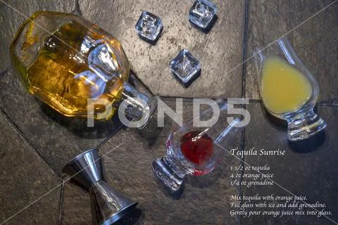 Ingredients for tequila sunrise on slate Stock Photos