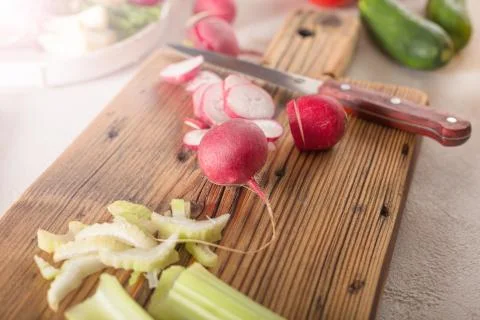Ingredients for vegetable salad on kitchen table, close up Stockfoto's