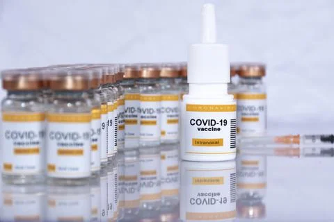 Inhaler with coronavirus vaccine Stock Photos