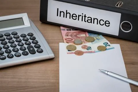 Inheritance written on a binder Stock Photos