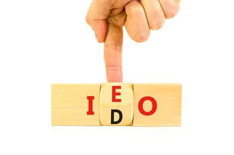 Initial exchange or DEX offering symbol. Concept words abbreviation IEO or .. Stock Photos