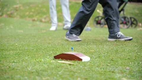 Initial golf swing on the course Stock Footage 306622000