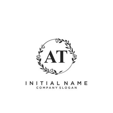 AT Initial handwriting logo design Illustrazione stock