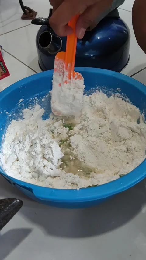 The initial process of making a traditional Indonesian snack called Sempol Stock Footage 201006068