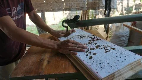 The initial process of making traditional Javanese Gebyok Stock Photos
