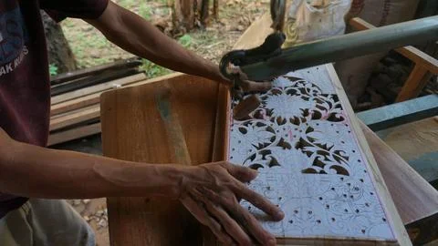 The initial process of making traditional Javanese Gebyok Stock Photos