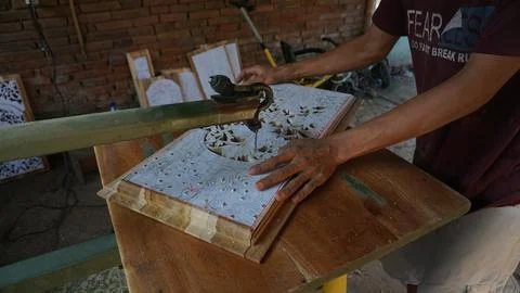 The initial process of making traditional Javanese Gebyok Stock Photos