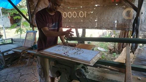The initial process of making traditional Javanese Gebyok Stock Photos