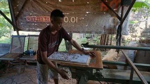 The initial process of making traditional Javanese Gebyok Stock Photos