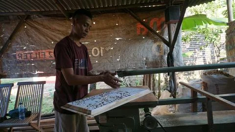 The initial process of making traditional Javanese Gebyok Stock Photos