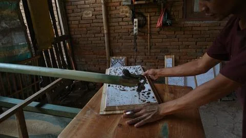The initial process of making traditional Javanese Gebyok Stock Photos
