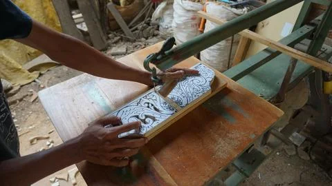 The initial process of making traditional Javanese Gebyok Stock Photos
