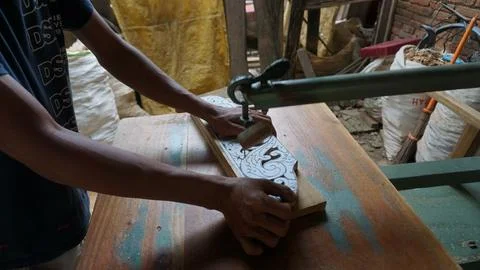 The initial process of making traditional Javanese Gebyok Stock Photos