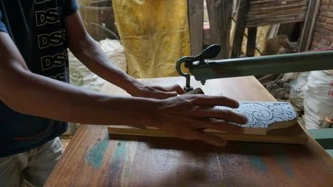The initial process of making traditional Javanese Gebyok Stock Photos