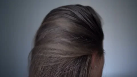 The initial stage of gray hair. The problem of gray hair in women. Stock Footage 218251451
