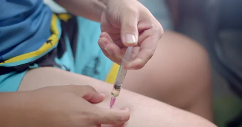 Inject Testosterone into the body.Increase Testosterone into the body. Stock Footage 282381773