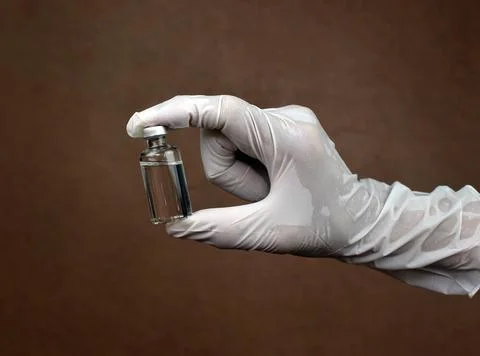 Injection in glass bottles Stock Photos
