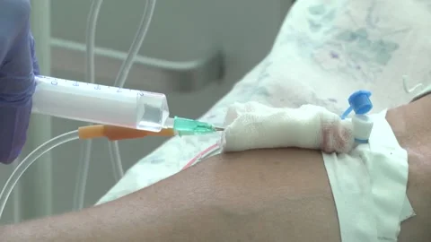 Injection into the hand. Clinic Stock Footage 114009006