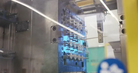 Injection Mold Plate with White Plastic Tips, Multi Cavity Tooling, Detail Shot Видео 340660696