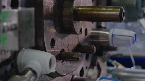 Injection molding machine for plastic products during operation. Technology for Stock Footage 231053064