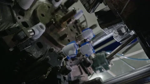 Injection molding machine for plastic products during operation. Technology for Stock Footage 231053226