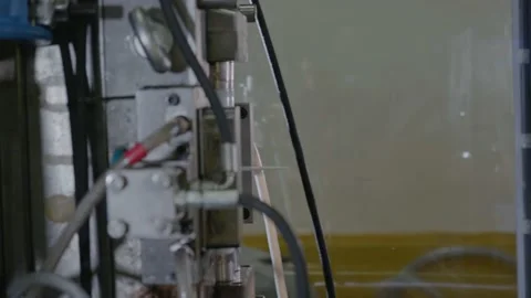 Injection molding machine for plastic products during operation. Technology for Vidéo 233604083