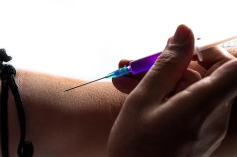 Injection narcotic on a white background Stock Photos