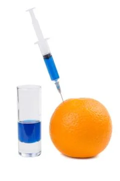 Injection of orange fruit Stock Photos