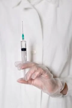 Injection, syringe in hand Foto stock