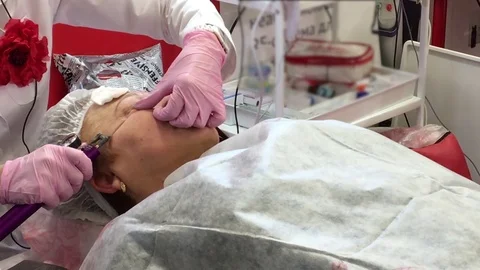 Injections under eye Stock Footage 73273691