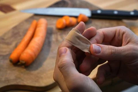 Injured in the kitchen while cooking Stock Photos