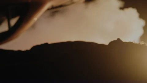 An injured man laying on the ground after a bad car crash Stock Footage 275117341