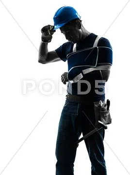 Injured manual worker man with injury brace despair silhouette Stock Photos