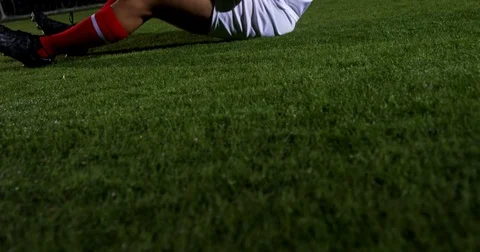 Injured soccer player lying 4k Stock Footage