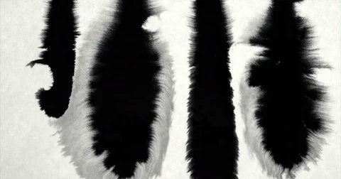 Ink absorbing into parchment paper. Calligraphy ink bleed concept Stock Footage